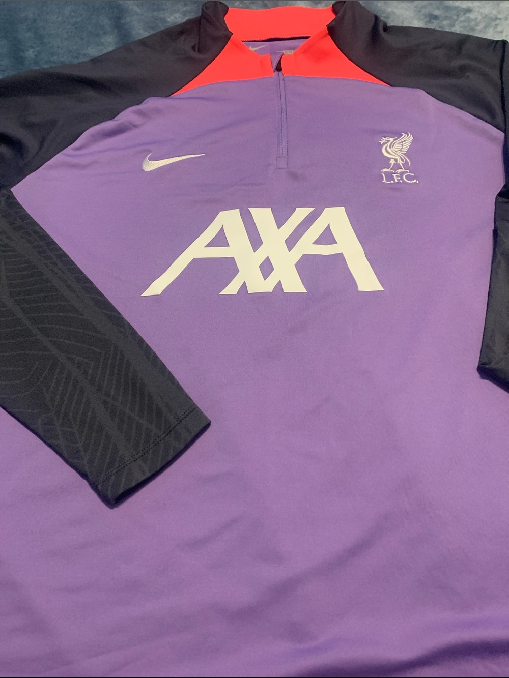 Nike Liverpool FC Dri-FIT Strike Quarter-Zip Pullover.
